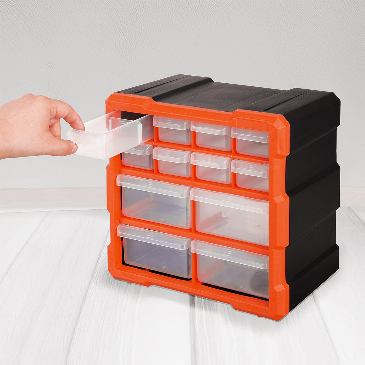 Vista de la capacidad apilable del organizador de 12 gavetas AG Box para optimización de superficies